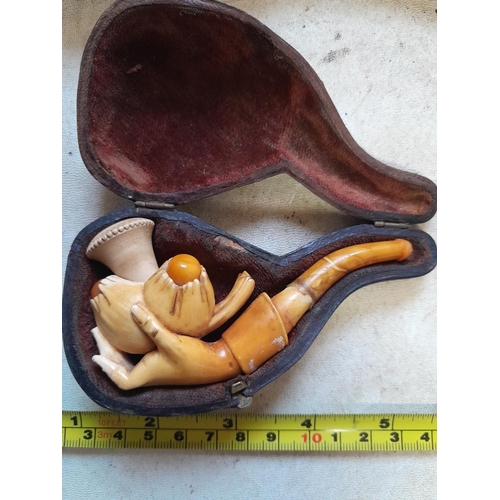 332 - Early 20th century carved meerschaum pipe modelled as a hand with buds of amber