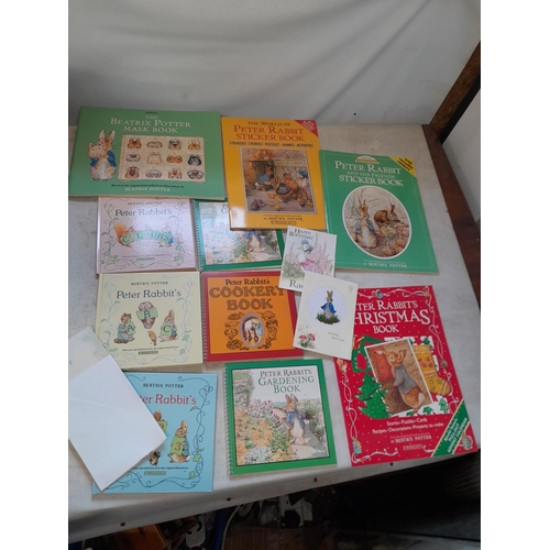 4 - Unused Beatrix Potter sticker books, Christmas book and related material