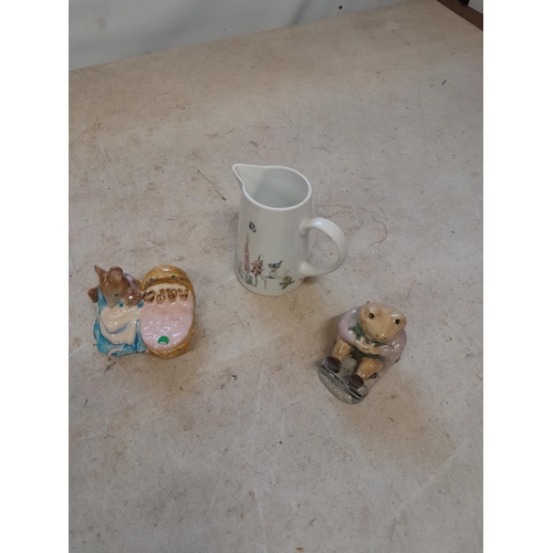 33 - 2 x Royal Albert Beatrix Potter figures and jug