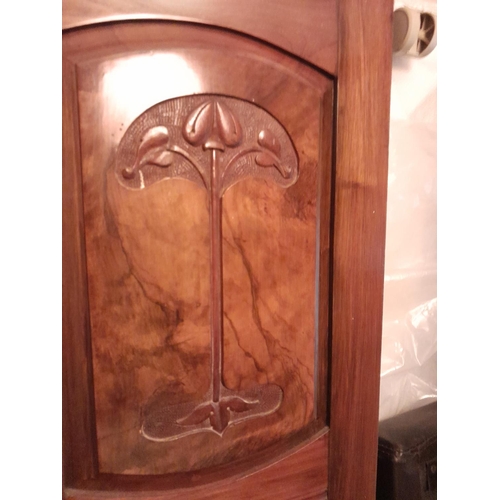 29 - Late Victorian carved red walnut wardrobe