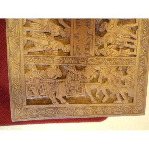 19 - Interesting carved hardwood panel on later base as a coffee table 80 cms x 49 cms x 37 cms