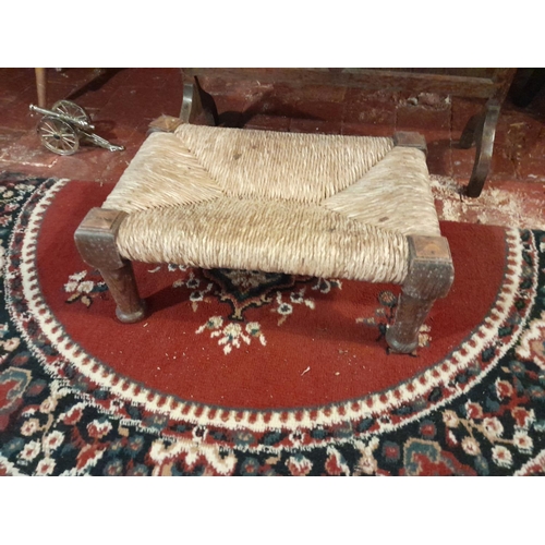 61 - Carved vintage spinning stool 90 cms x 30 cms and  rush seated foot stool