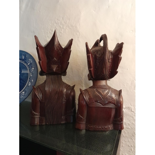 83 - Pair of 20th century carved South East Asian hardwood busts