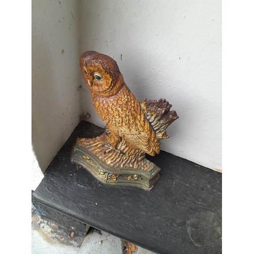 105 - Cast iron owl door stop