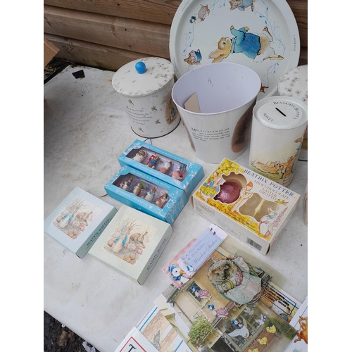 94 - World of Beatrix Potter and Peter Rabbit collectables : game, tins waste paper basket and related it... 