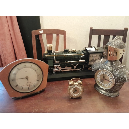 124 - Assorted vintage clocks : Metamec, plastic railway quartz clock