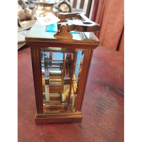 126 - Vintage carriage clock with key