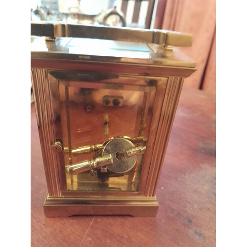 126 - Vintage carriage clock with key