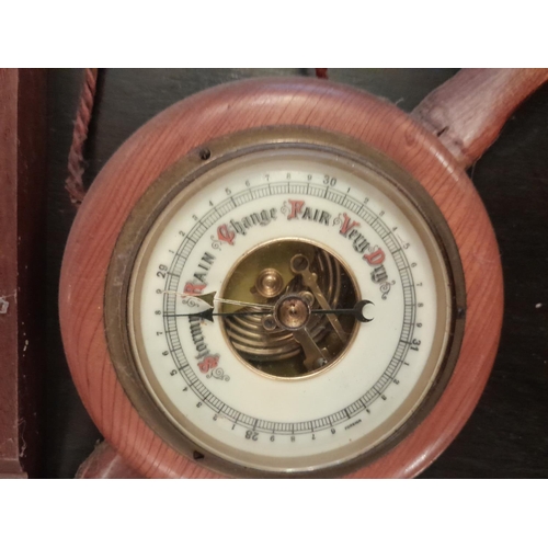 131 - Vintage barometers including small aeroplane boss barometer