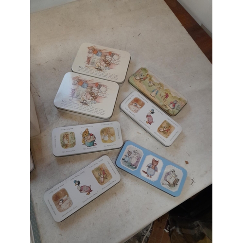 160 - World of Beatrix Potter and Peter Rabbit collectables : various tins and pencil tins