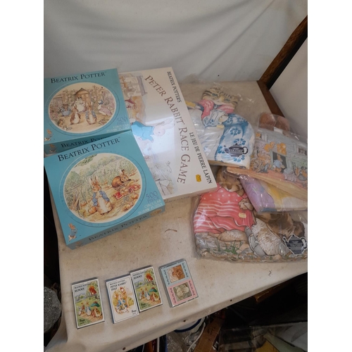 162 - World of Beatrix Potter and Peter Rabbit collectables : boxed sealed and other games and related ite... 