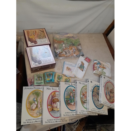 163 - World of Beatrix Potter and Peter Rabbit collectables : boxed sealed and other games and related ite... 