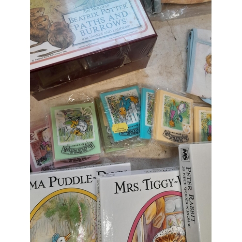 163 - World of Beatrix Potter and Peter Rabbit collectables : boxed sealed and other games and related ite... 