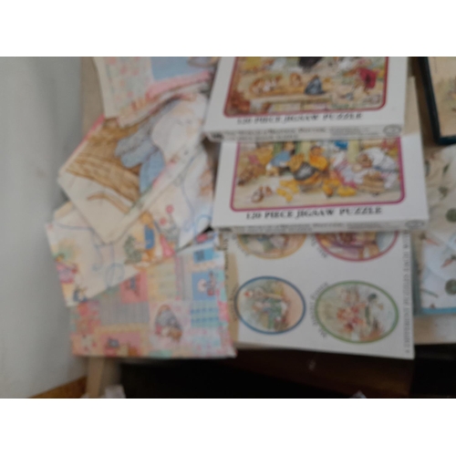 164 - World of Beatrix Potter and Peter Rabbit collectables : fabric and textiles, boxed games and puzzles... 