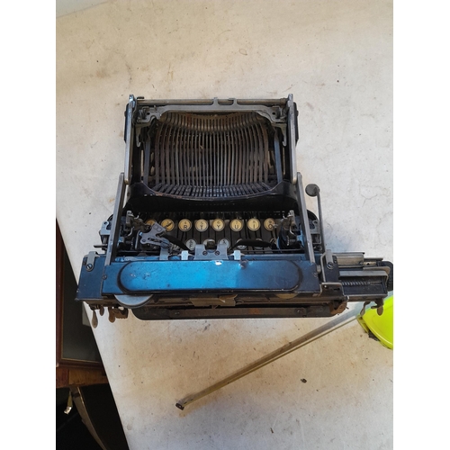 81 - Early 20th century Coronet folding model typewriter with instruction and brush