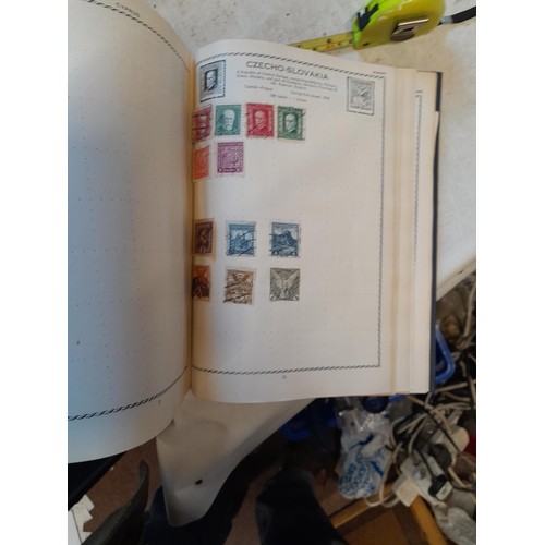 83 - 2 x sparsely filled albums of 20th century stamps of the world