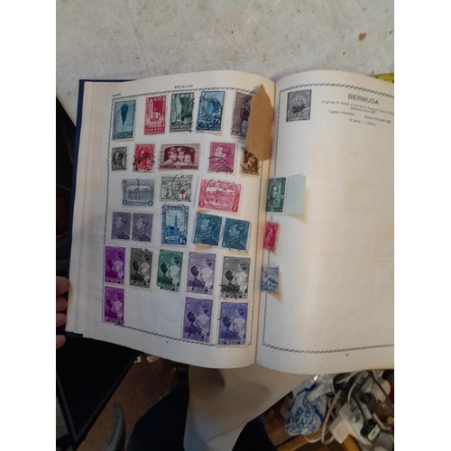 83 - 2 x sparsely filled albums of 20th century stamps of the world