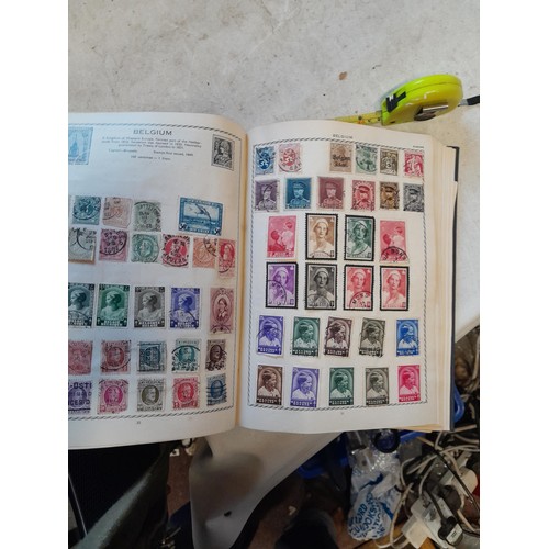 83 - 2 x sparsely filled albums of 20th century stamps of the world