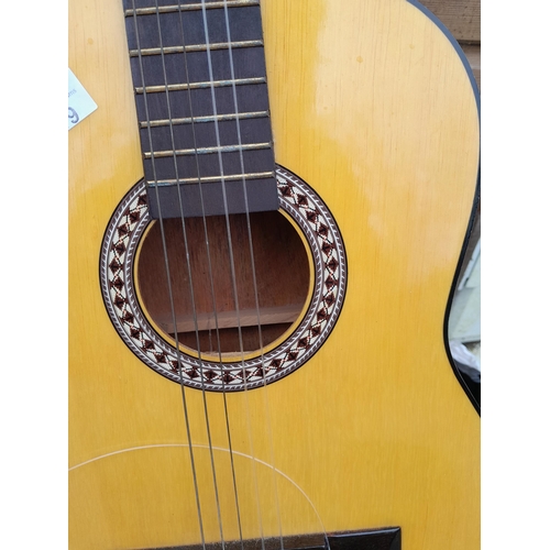 119 - Non branded acoustic guitar