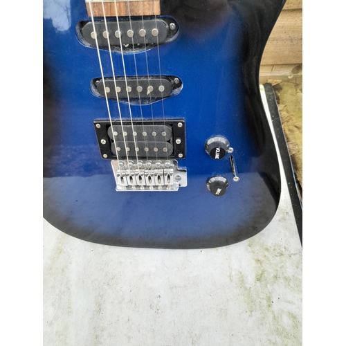 130 - Vintage Woody blue body electric guitar