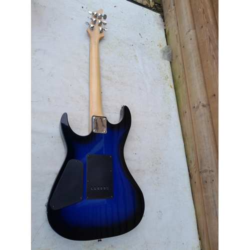 130 - Vintage Woody blue body electric guitar