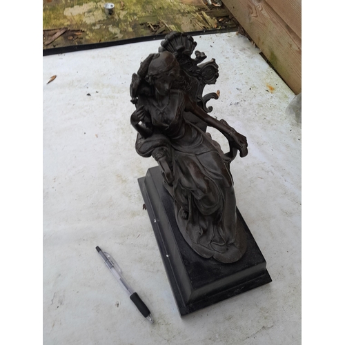 140 - 20th century bronzed metal lady on marble base