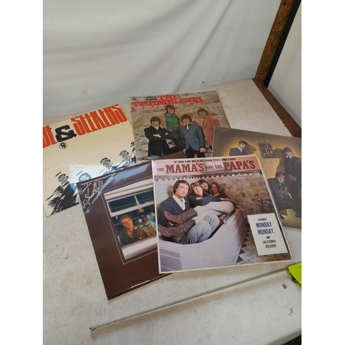 328 - Vinyl record albums : Mamas & Papas etc. , signed Frank Ifield in a record carry case