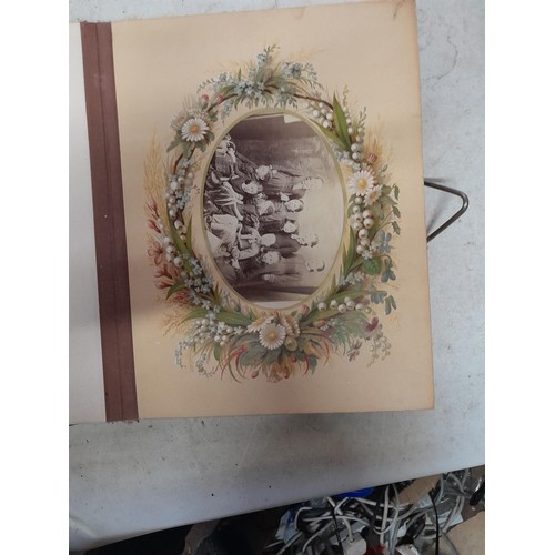 1A - Loosely bound Edwardian album of black and white family photographs