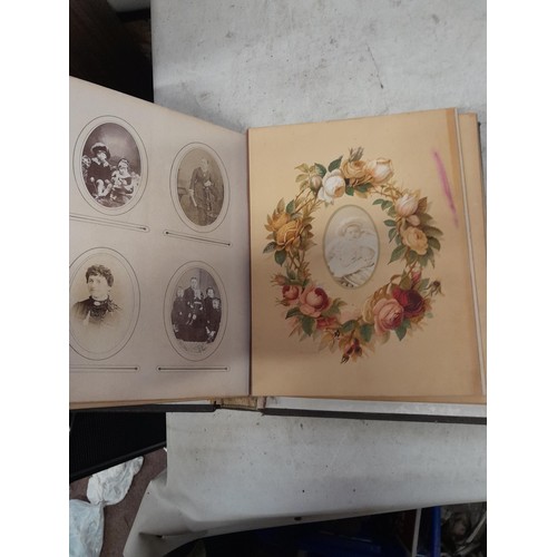 1A - Loosely bound Edwardian album of black and white family photographs