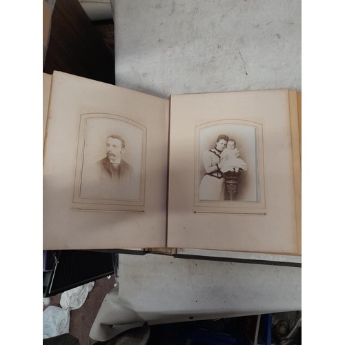 1A - Loosely bound Edwardian album of black and white family photographs