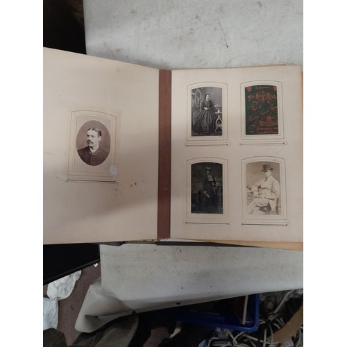 1A - Loosely bound Edwardian album of black and white family photographs