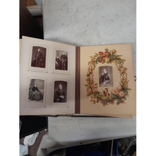 1A - Loosely bound Edwardian album of black and white family photographs