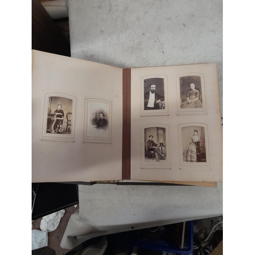 1A - Loosely bound Edwardian album of black and white family photographs