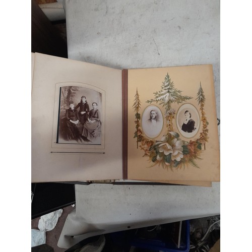 1A - Loosely bound Edwardian album of black and white family photographs