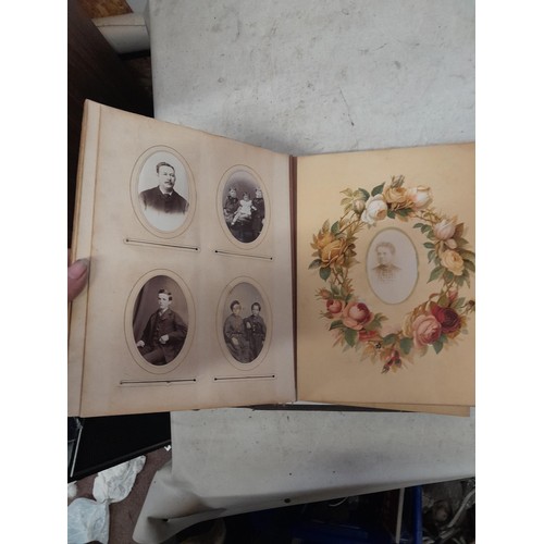 1A - Loosely bound Edwardian album of black and white family photographs