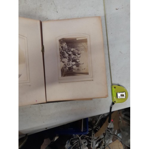 1A - Loosely bound Edwardian album of black and white family photographs