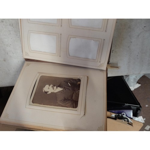 3 - Early 20th century sparsely filled black and white family photograph album, note macabre dead baby p... 