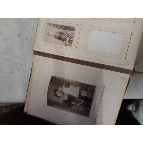 3 - Early 20th century sparsely filled black and white family photograph album, note macabre dead baby p... 