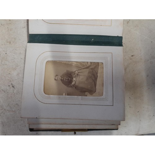 3 - Early 20th century sparsely filled black and white family photograph album, note macabre dead baby p... 