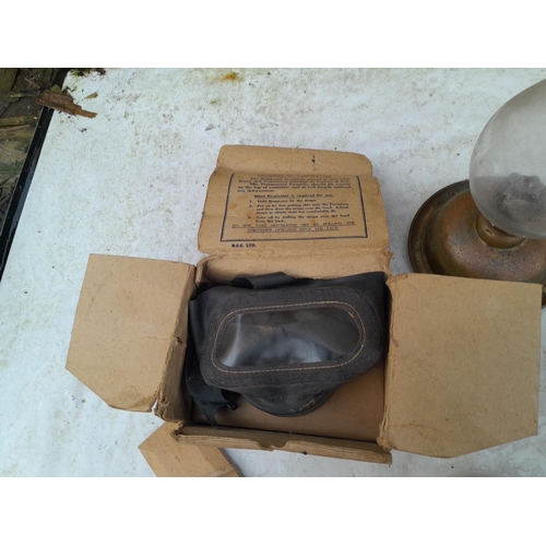 13 - Vintage suitcase, gas mask, dressing table set