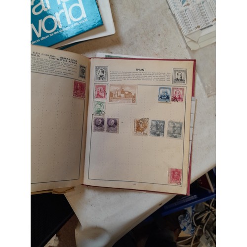 23 - Collection of 20th century stamps of the world mounted in 2 x albums, loose mint and used stamps