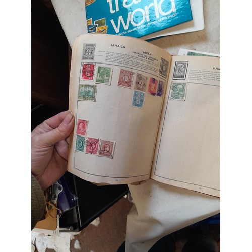 23 - Collection of 20th century stamps of the world mounted in 2 x albums, loose mint and used stamps