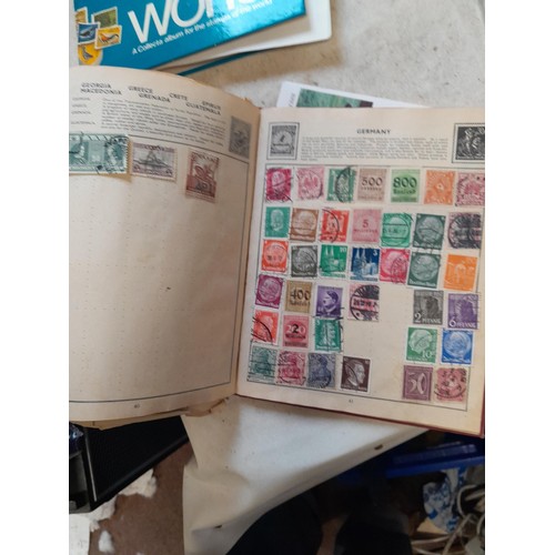 23 - Collection of 20th century stamps of the world mounted in 2 x albums, loose mint and used stamps