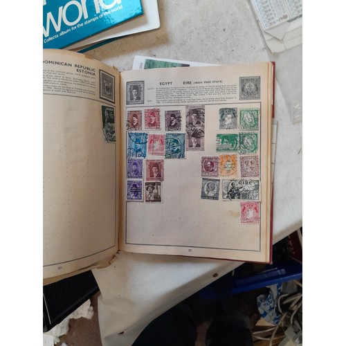 23 - Collection of 20th century stamps of the world mounted in 2 x albums, loose mint and used stamps