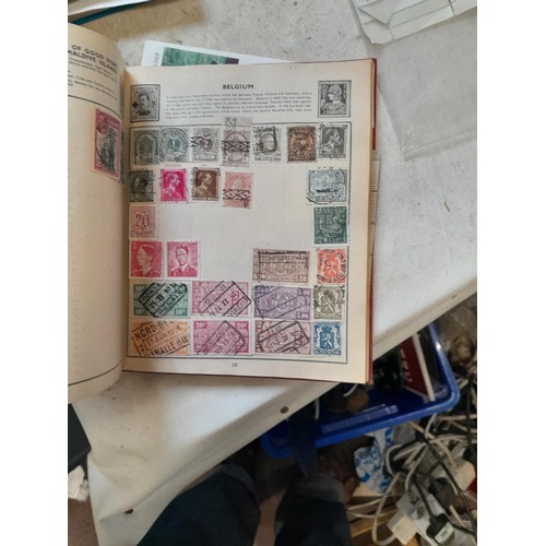 23 - Collection of 20th century stamps of the world mounted in 2 x albums, loose mint and used stamps