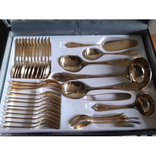 58 - Silt and gilt plated cutlery set by SBS Rostfrei  in case of issue, complete