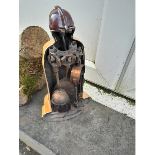 84 - Vintage cast iron and enamel fireside companion modelled as a knight