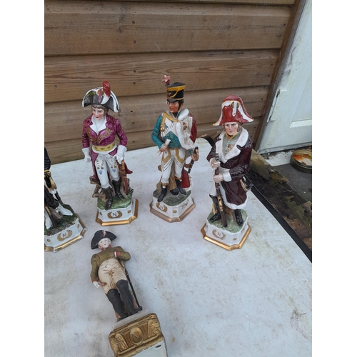 132 - Porcelain figures of soldiers and leading military figures of the 19th century