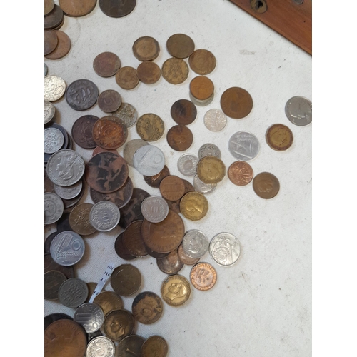 135 - Coins : GB and foreign mainly base metal coinage in mahogany instrument box & £1 & 10 Shilling note