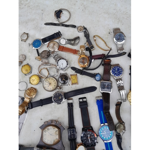 145 - Varied array of vintage and modern wristwatches